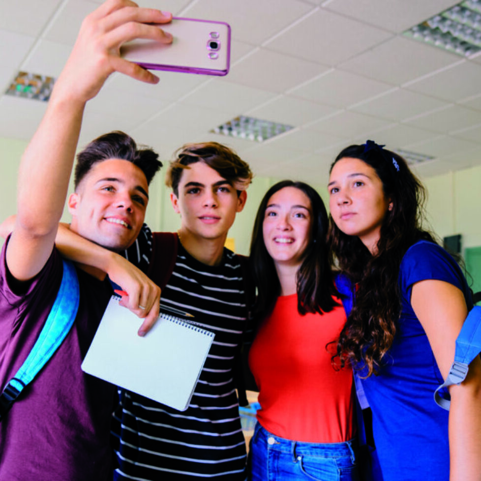 group schoolkids taking selfie classroom group schoolkids taking selfie classroom